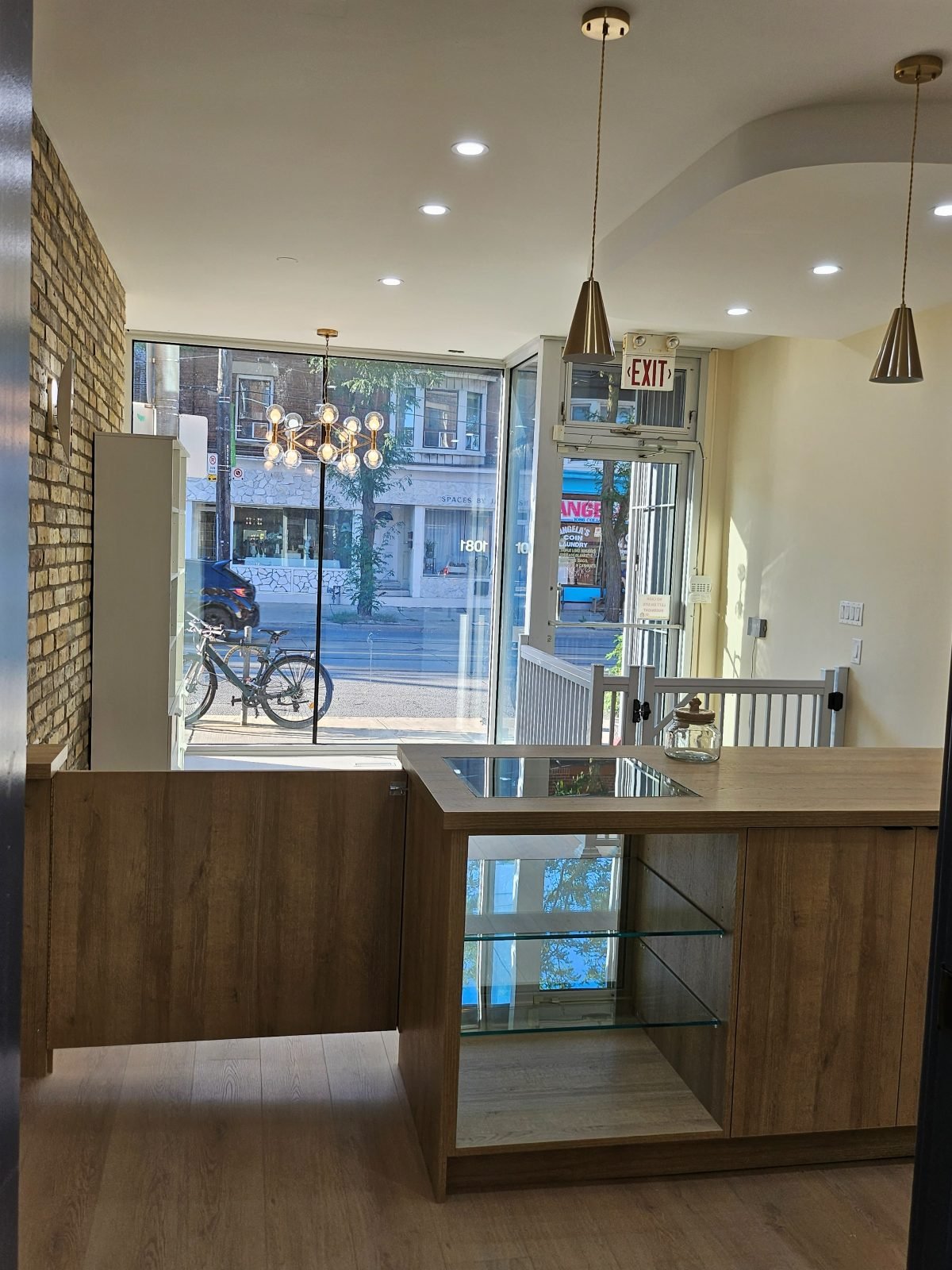 Front reception area at Rumi Grooming Studio with a view onto College Street